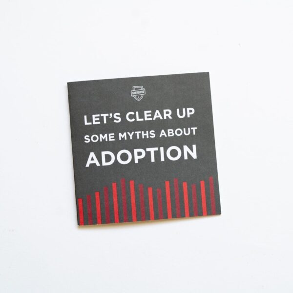 The "Myths Booklet" is a black brochure with white text that reads, "LET'S CLEAR UP SOME MYTHS ABOUT ADOPTION," featuring a red bar graph design at the bottom.