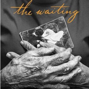 A pair of elderly hands clasping a black-and-white photo with the text "the waiting" written in cursive at the top in gold.